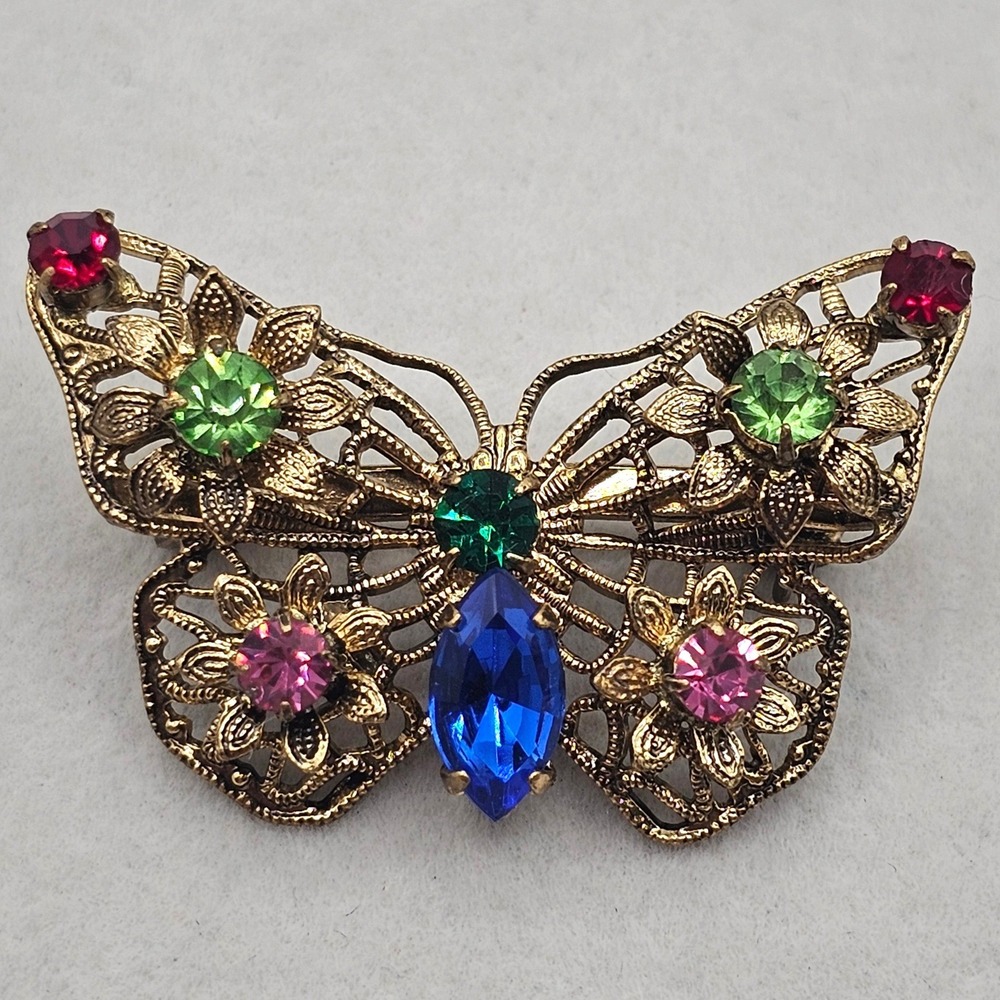 Vintage Rhinestone Butterfly Brooch Gold Tone Filigree Multi Color Stone Pin